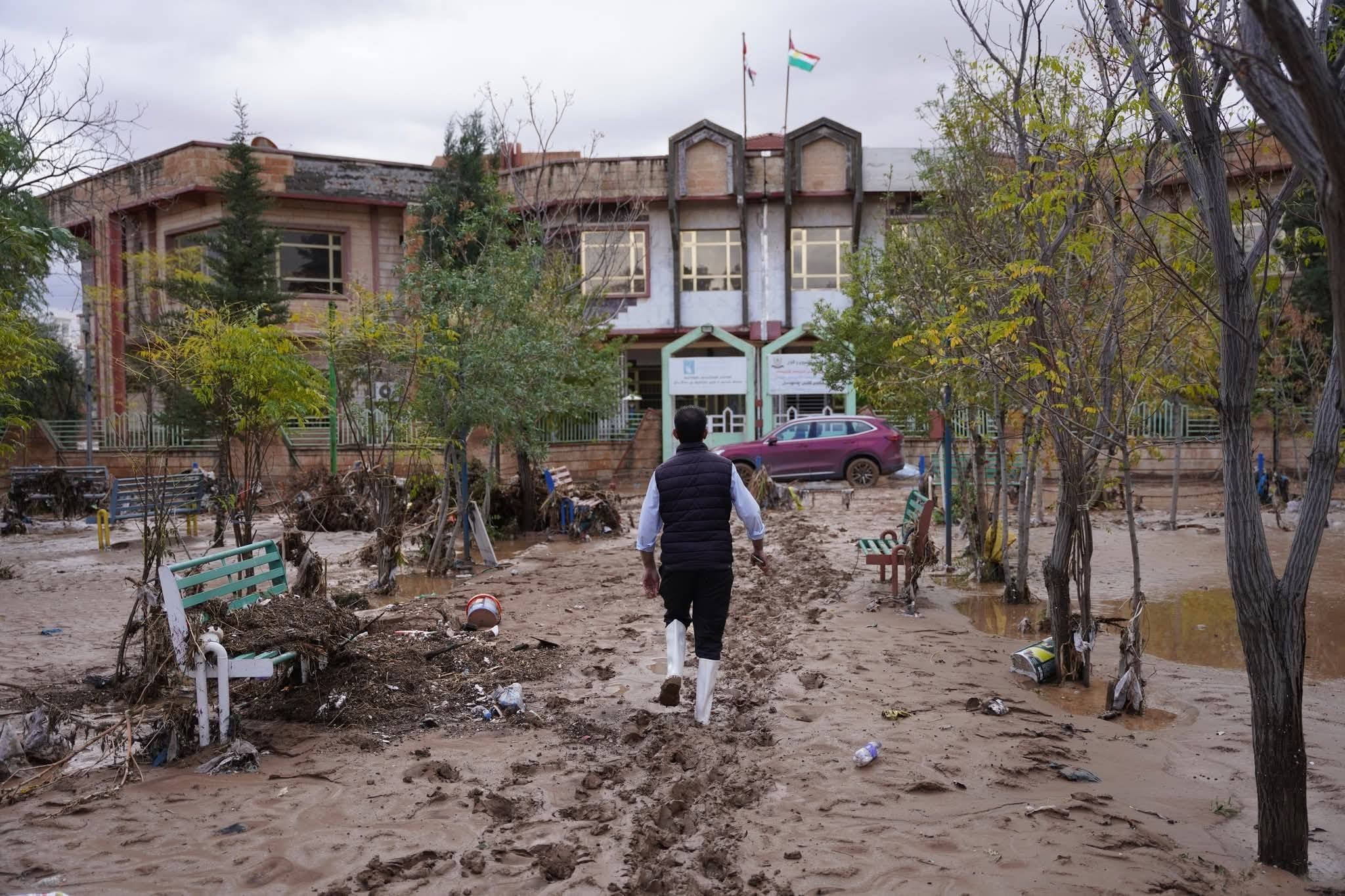 Response teams coordinating emergency relief efforts for affected families